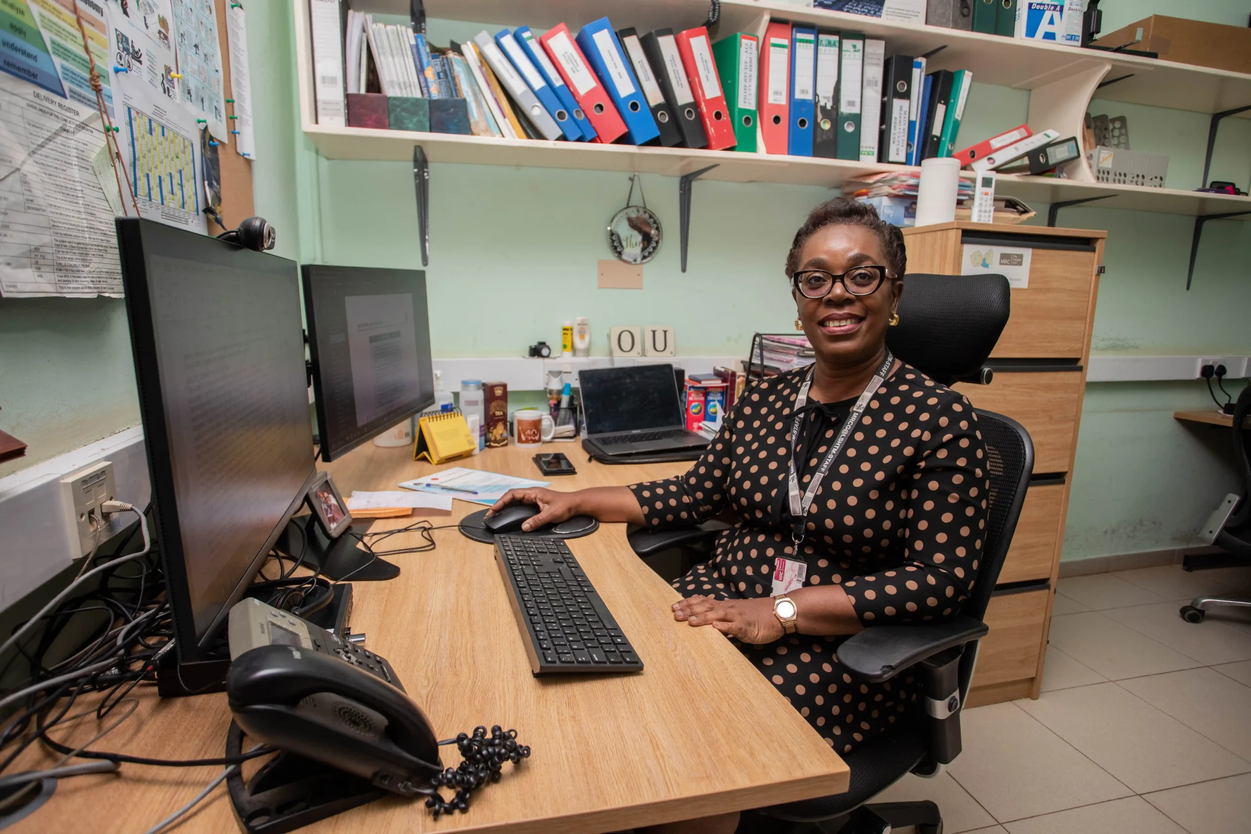 Picture of woman at her work desk