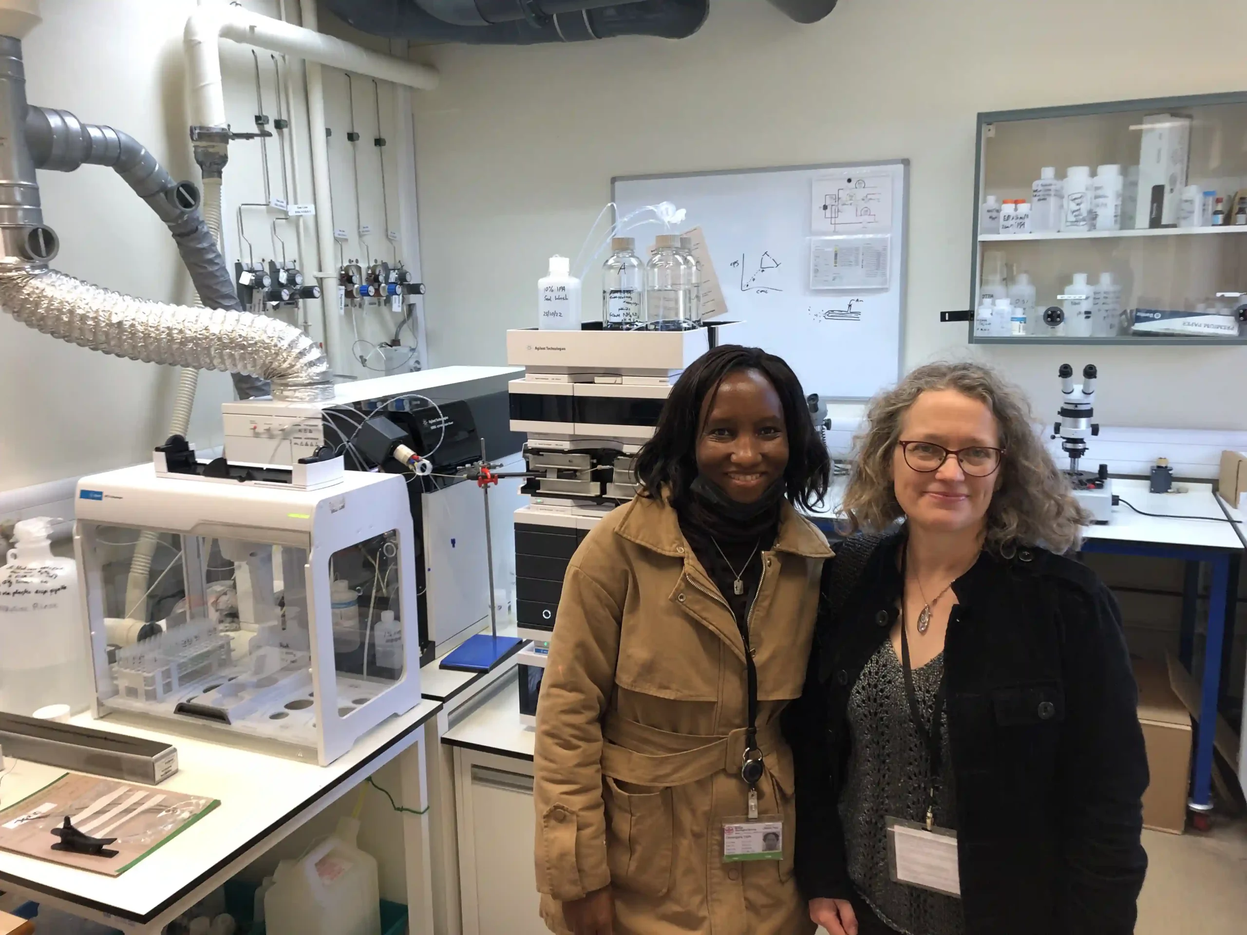 picture of two women standing in a lab